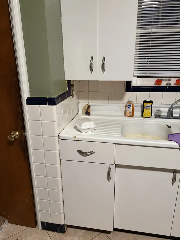 Kitchen after a Fresh Start cleaning in St. Louis, MO — sink, counter and backsplash