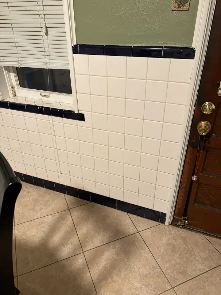 Kitchen after a Fresh Start cleaning in St. Louis, MO — tile wall and window ledge